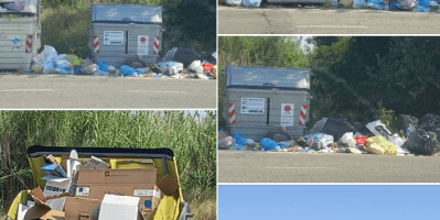 Cassonetti per la raccolta dei rifiuti circondati da sacchi, cartoni e materiali abbandonati tra via Fontanette e via Valle Quarta ad Alessandria.