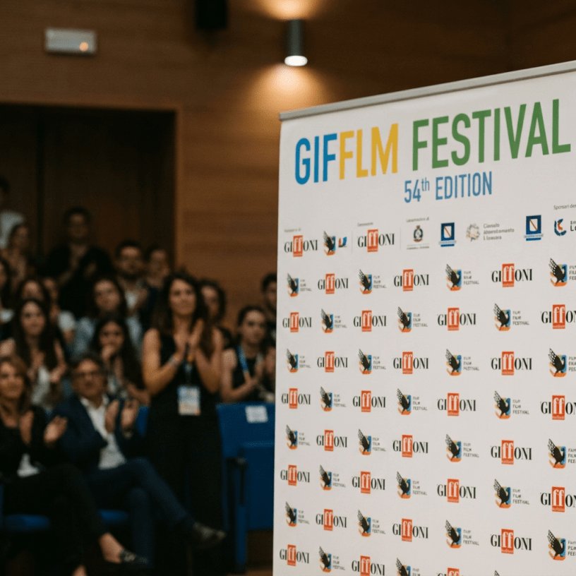 Man giving speech at Giffoni Film Festival podium