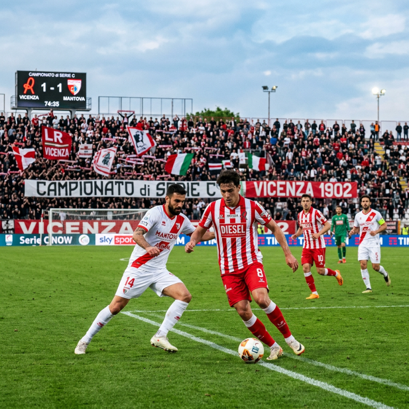 Vicenza and Mantova players contest the ball during a Serie C match