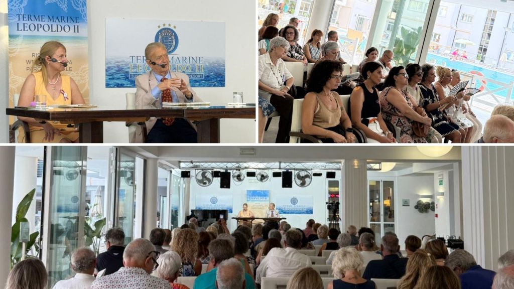 A panel discussion at Terme Marine Leopoldo II with two speakers and an audience.