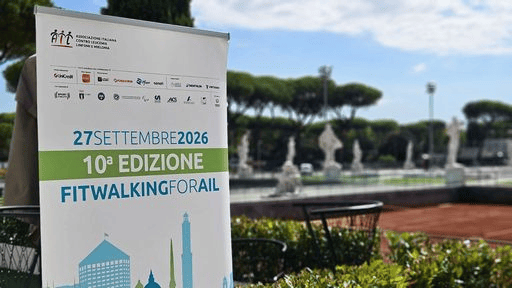Banner announcing the 10th edition of Fit Walking for Rail event on September 27, 2026, set in a garden environment with classical statues in the background.